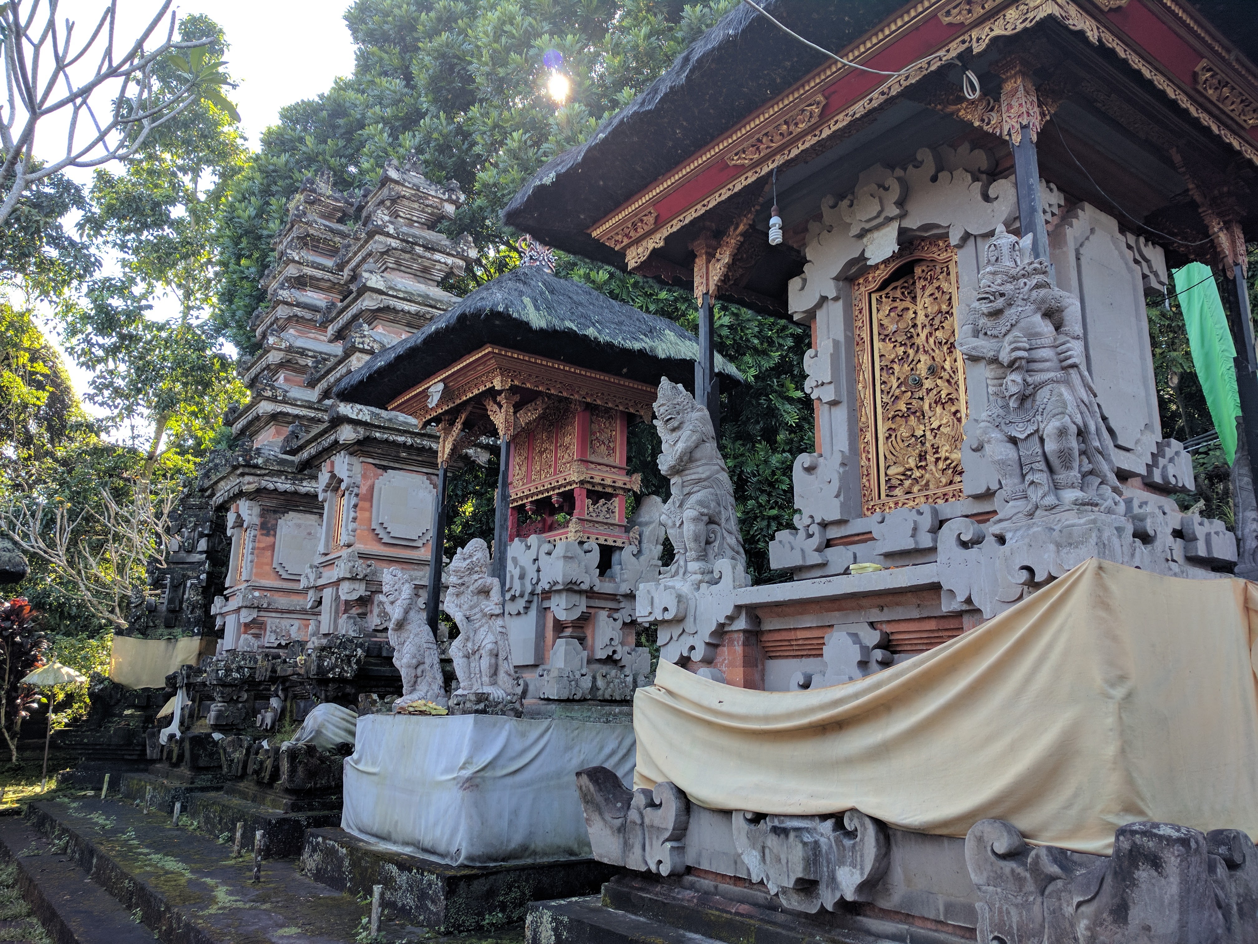 Small but picturesque Dalem Segara Temple in Bali, Indonesia, beautiful carved stone buildings