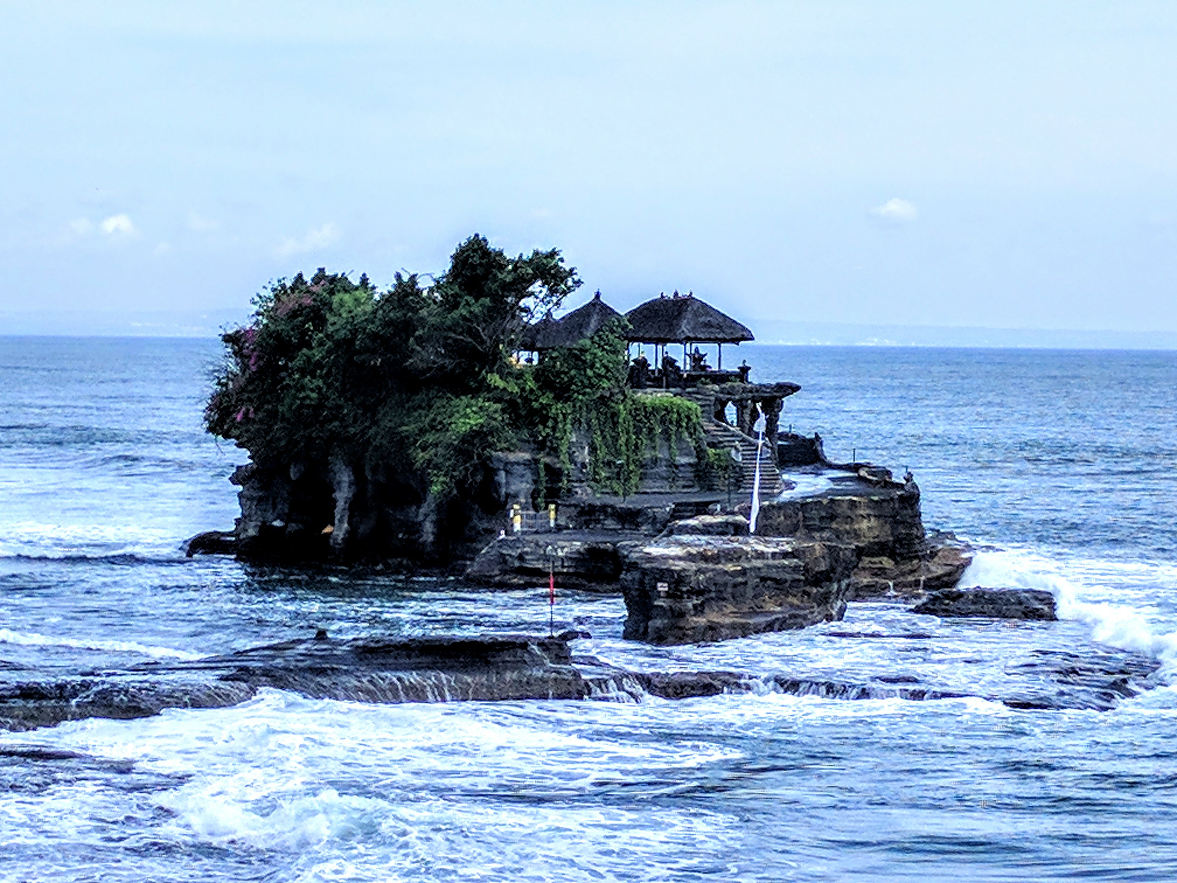 View of the Tanah Lot temple in the Indian Ocean off the coast of Bali